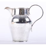 Silver milk jug with plain body and ribbed scroll handle, London, Maker: H.L., Lambert of