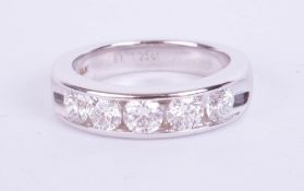 A 14ct white gold half band eternity ring, approximately 1.25ct, set with quality diamonds, size M.