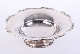 Silver nut dish on rising stem with ribbon and foliate decoration to border, Birmingham, Maker: A