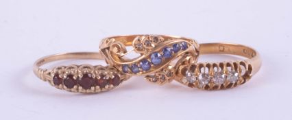 Three antique rings, including two 18ct rings, one set with diamonds, the other blue stone (6g)