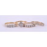 An 18ct diamond ring approx. 2.6g together with three 9ct gold dress rings approx. 5.8g (4).