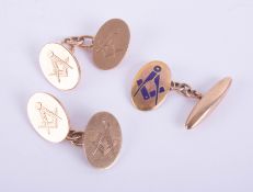 A pair of Masonic 9ct gold cufflink and another (3) approximately 14.6g.