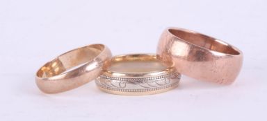 Three 9ct gold wedding band rings, approx. 11.6gms.