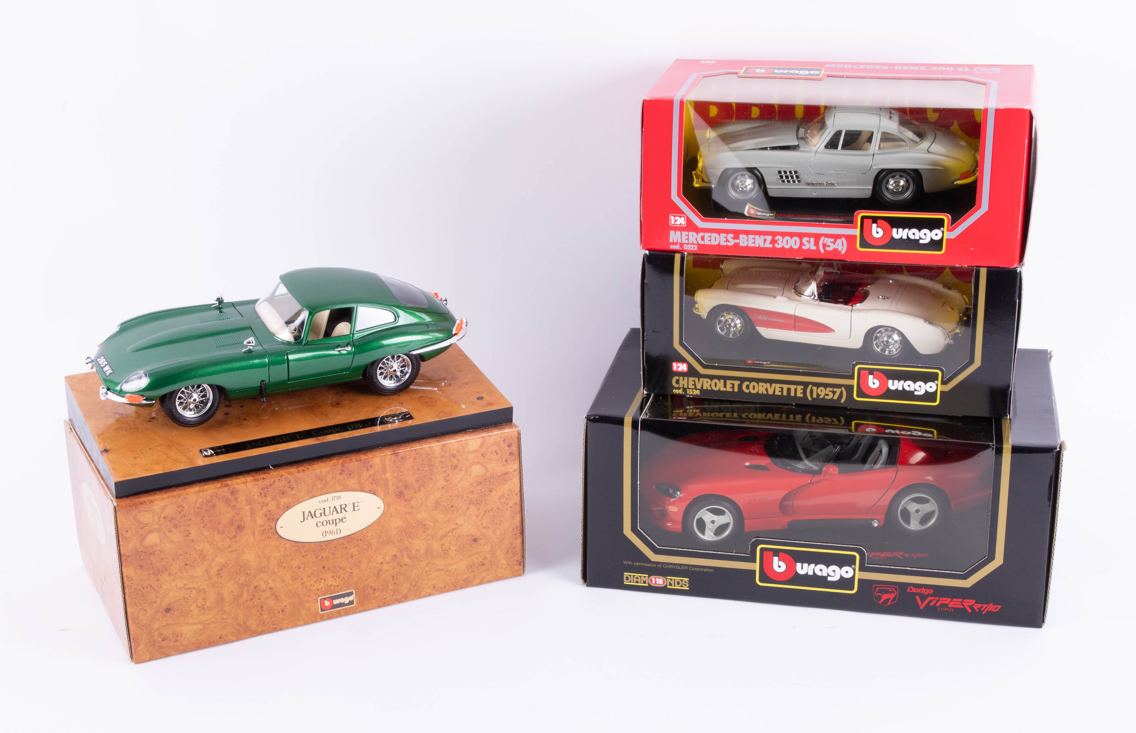 Burago, Jaguar E Coupe 1961, together with three scale Burago models, boxed (4).