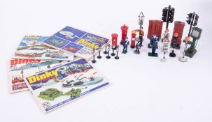 A collection of various diecast figures including mailboxes, traffic lights, pillar boxes, dinky