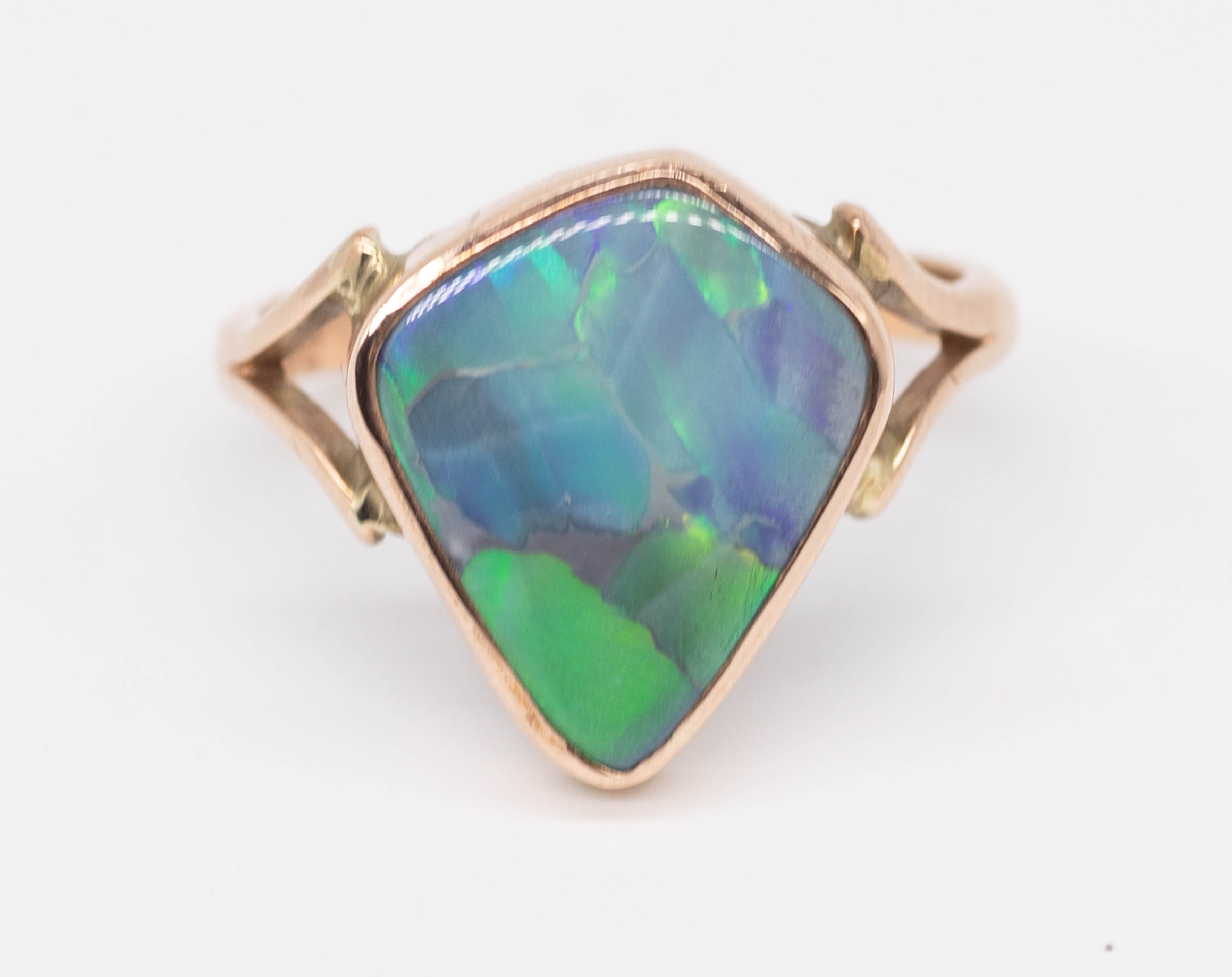 A 9ct large opal set dress ring, size V.