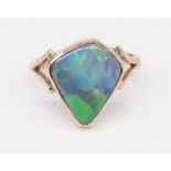 A 9ct large opal set dress ring, size V.