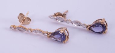 A pair of diamond set and tanzanite drop earrings, length approximately 25mm.