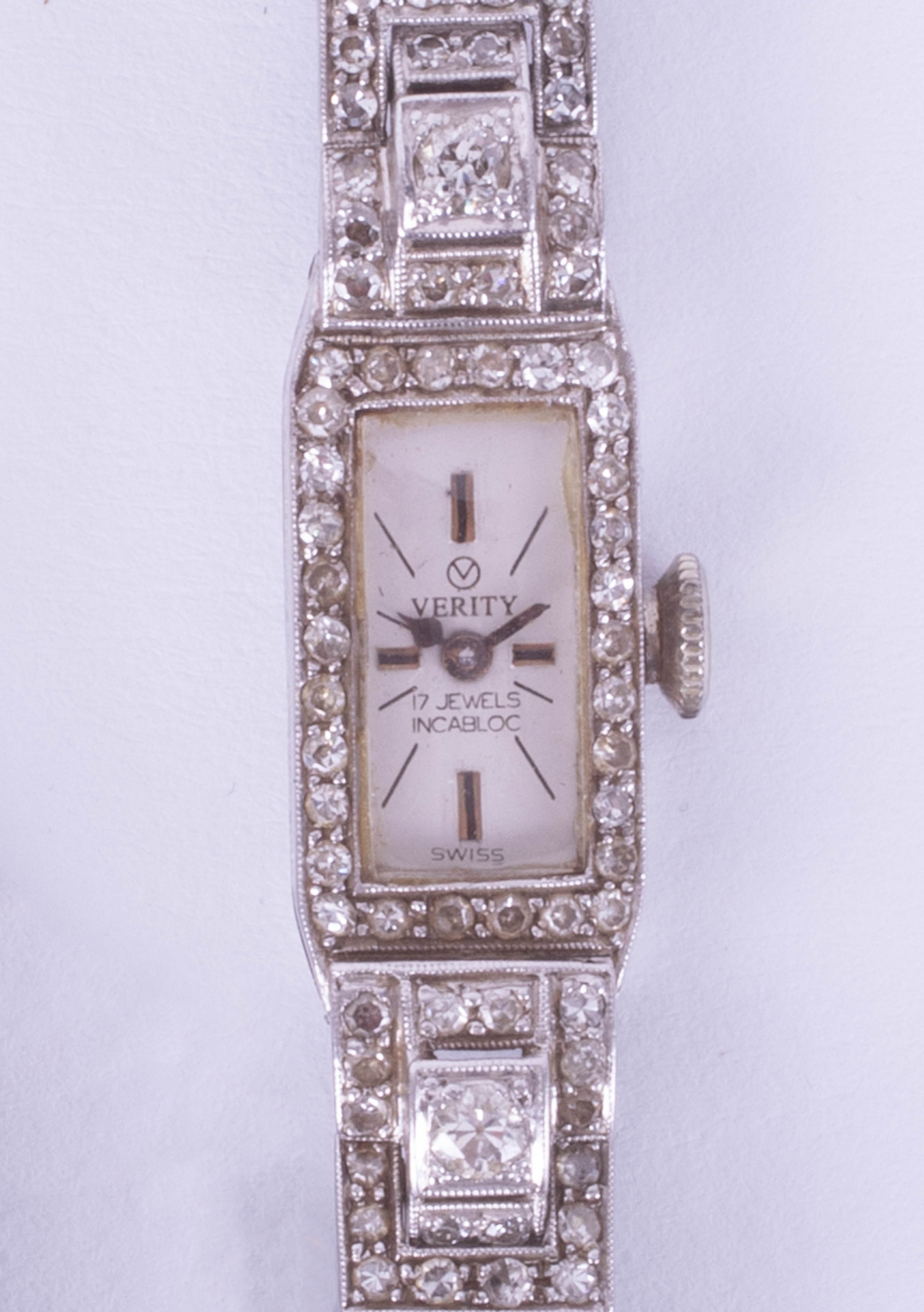 An 18ct ladies diamond set cocktail watch in white gold, the dial marked 'Verity, 17 Jewels,