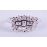 An 18ct white gold diamond 'boat' cluster ring, diamond weight approx 0.50ct, ring size K.