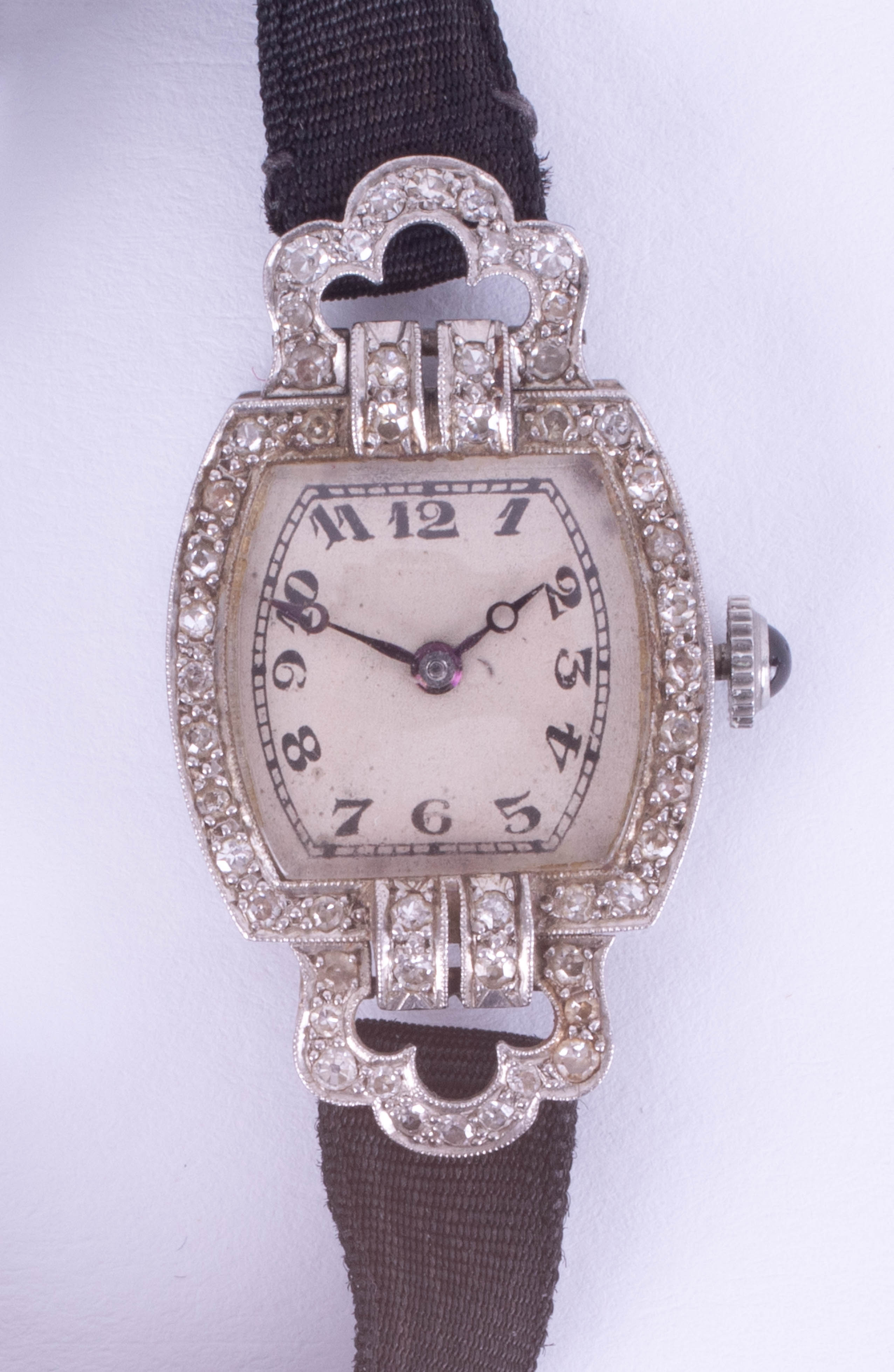 An 18ct gold and platinum diamond set ladies wristwatch.