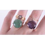 A large amethyst ring, set in gold? indistinct marks, size K, a jade set dress ring, size K, a small