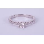 Leo Diamond, a solitaire ring set in platinum with a single diamond, stamped inside the band 0.18