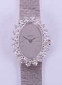 Chopard Geneve, a ladies 18ct white gold diamond set watch with twenty matched brilliant cut