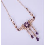 An antique amethyst and pearl set necklace in possibly original box marked 'Kemp Wilcox,