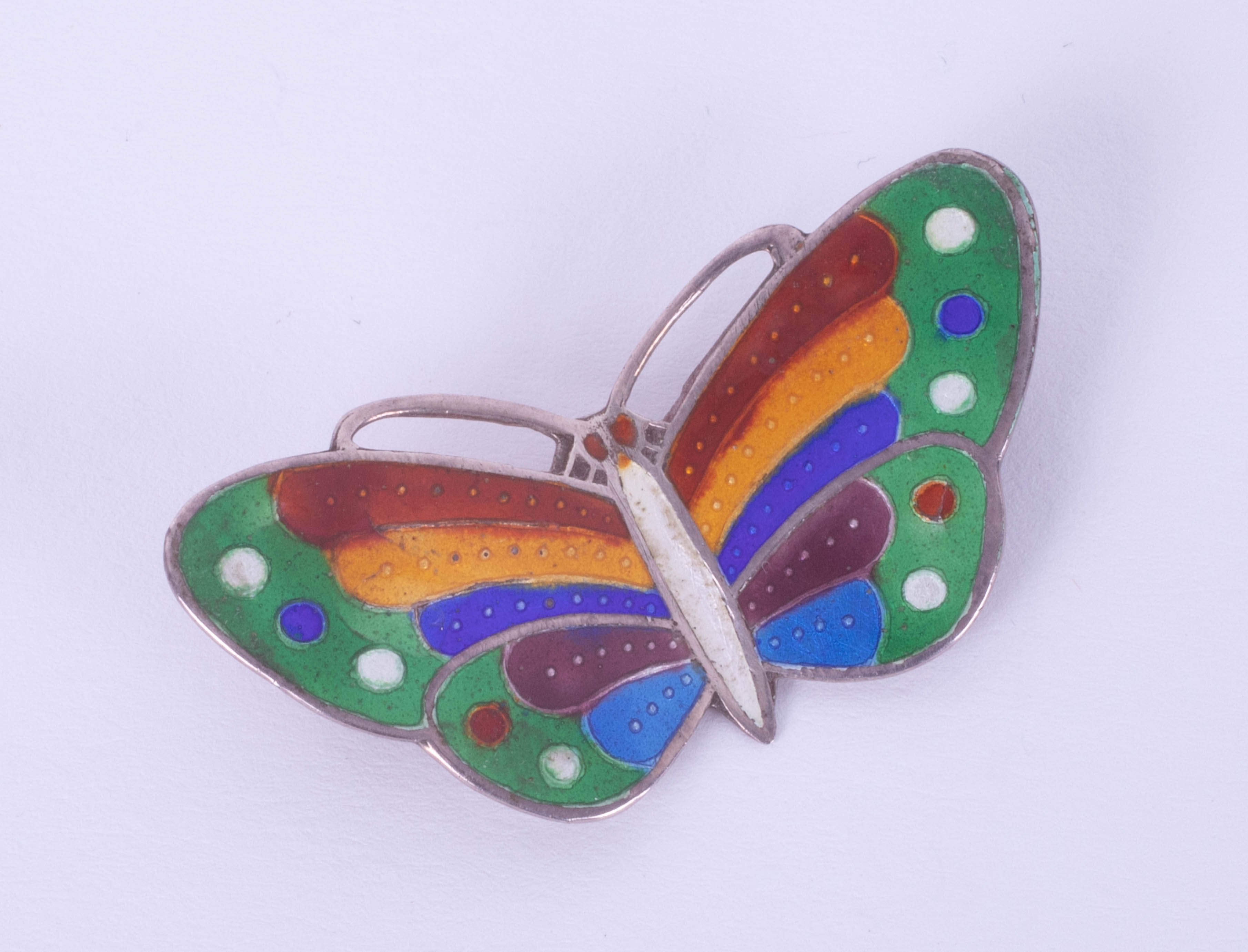 A silver and enamel butterfly brooch, span 44mm.