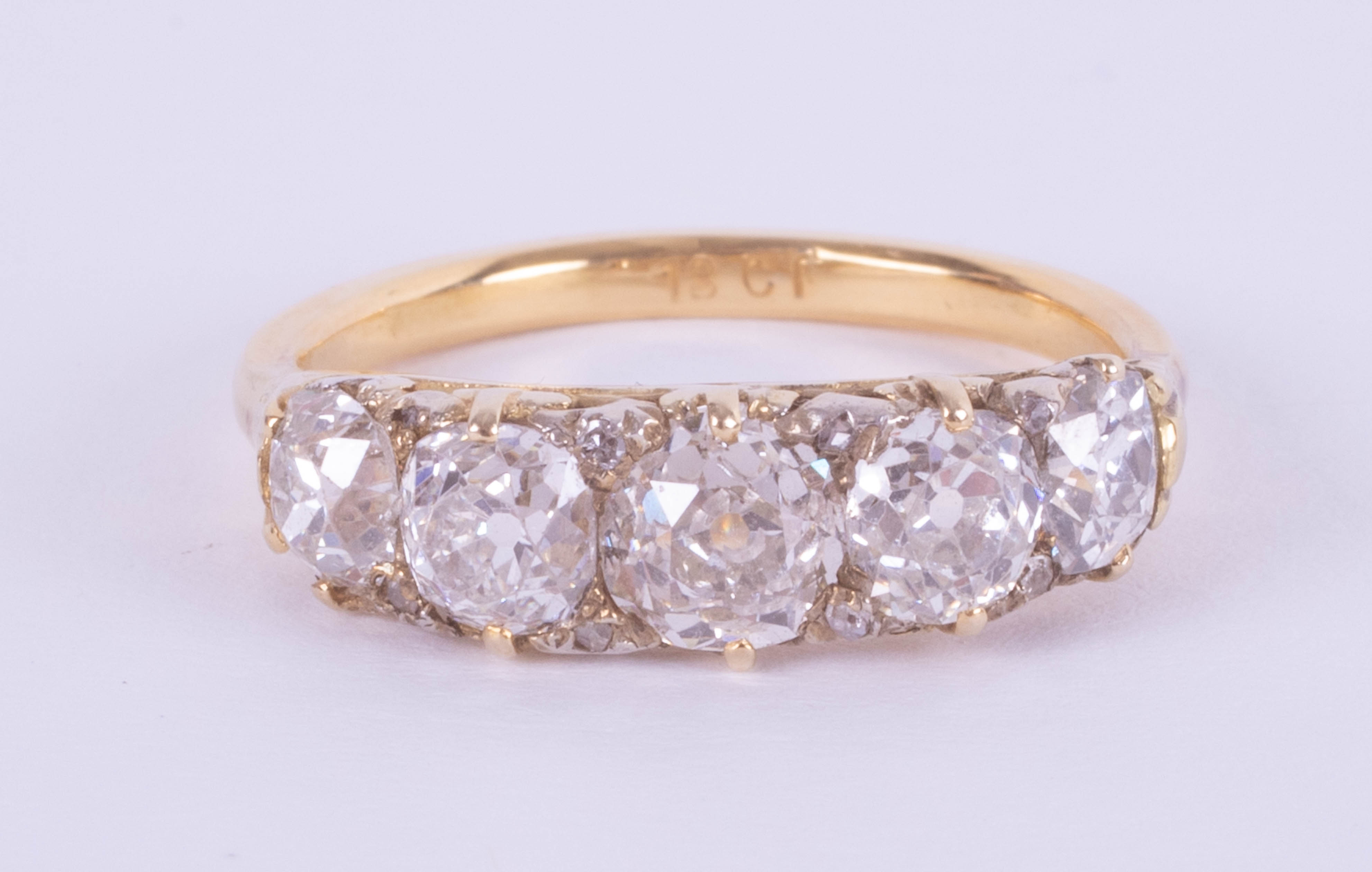 A good 18ct diamond five stone ring, diamond weight over 2ct, set in yellow gold, size R.