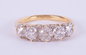 A good 18ct diamond five stone ring, diamond weight over 2ct, set in yellow gold, size R.