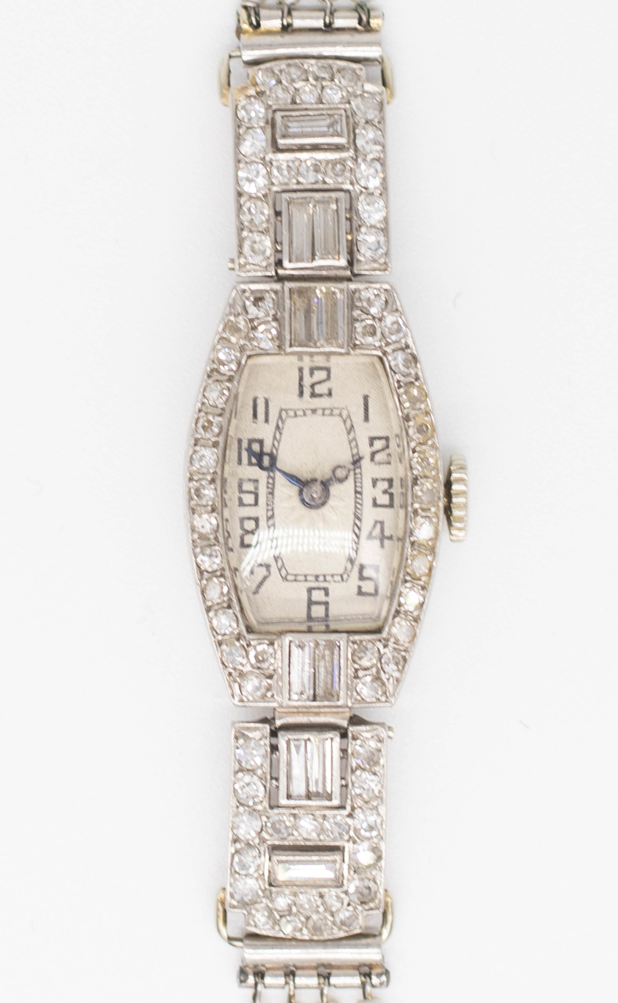 An Art Deco style white gold diamond set cocktail watch fitted with a pearl bracelet together with