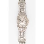 An Art Deco style white gold diamond set cocktail watch fitted with a pearl bracelet together with