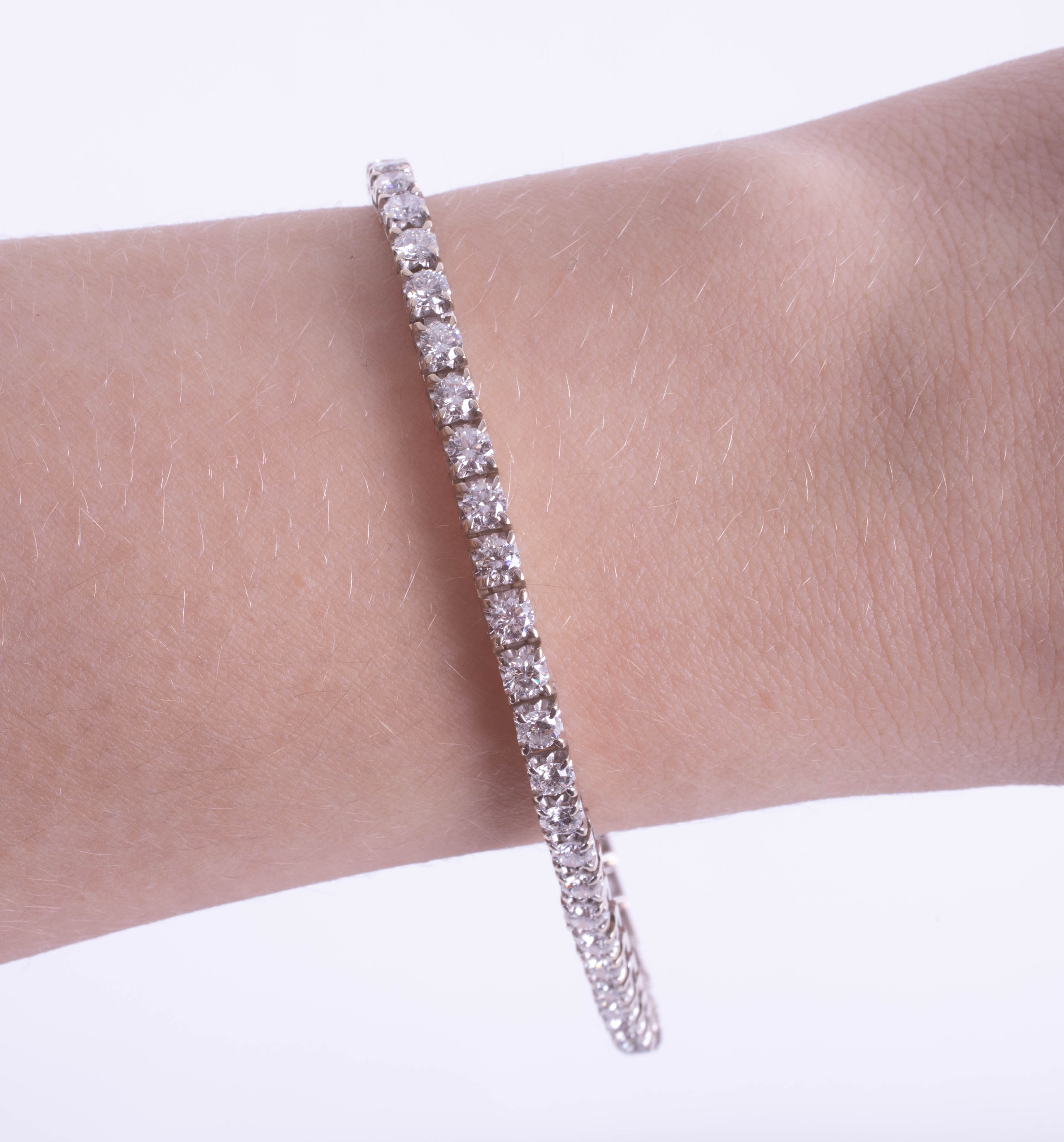 A fine 18ct white gold and diamond set line bracelet, set with fifty diamonds, total diamond - Image 2 of 2