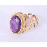 A stylish contemporary 18ct and amethyst set ring, size Q.