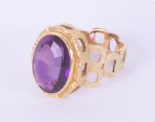 A stylish contemporary 18ct and amethyst set ring, size Q.