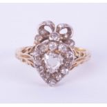 A Victorian diamond set heart ring, size J, boxed.