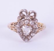 A Victorian diamond set heart ring, size J, boxed.