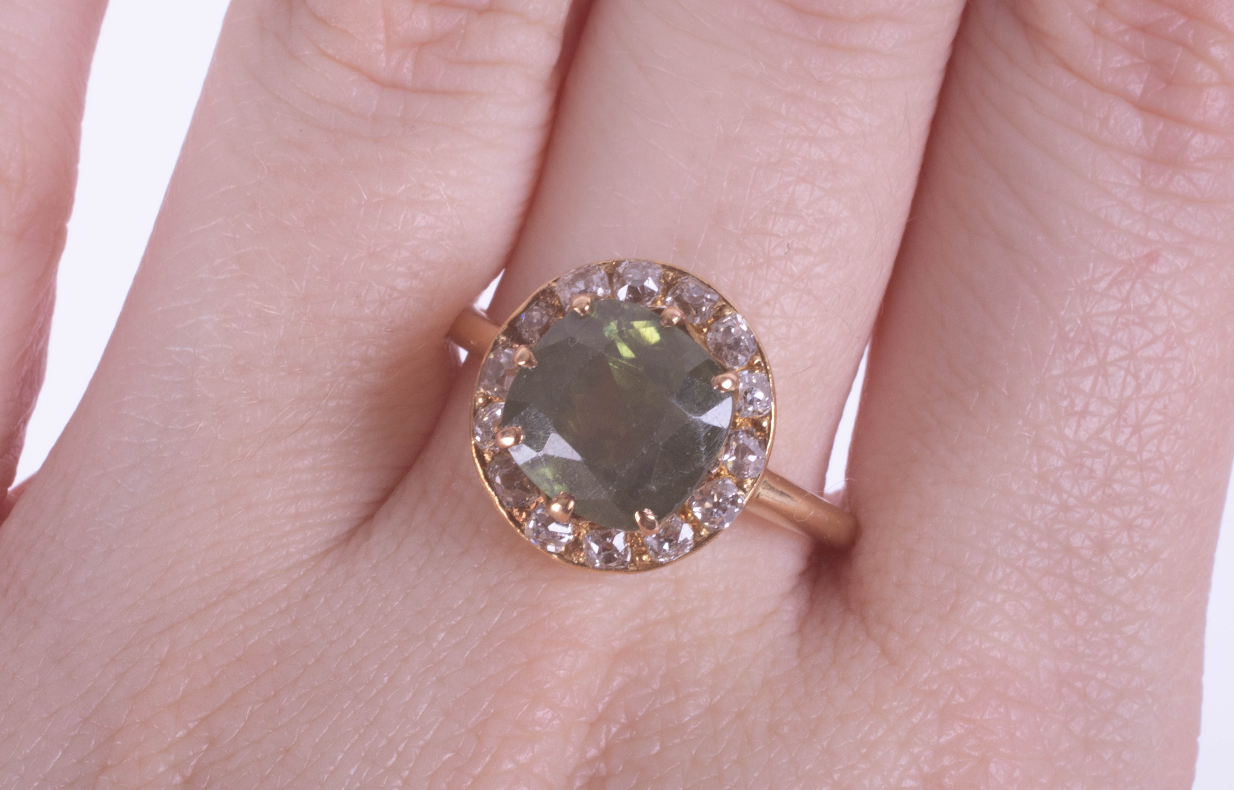 A green zircon and diamond set cluster ring, size T. - Image 2 of 2