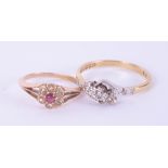 Two 18ct gold and diamond set dress rings, 5.4g, sizes S and J.