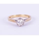 An 18ct diamond solitaire ring approximately 30 points, set in yellow gold, size L.