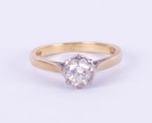 An 18ct diamond solitaire ring approximately 30 points, set in yellow gold, size L.