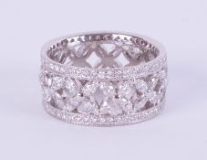 A platinum marquise and brilliant cut diamond set full eternity ring, width 9.50mm, weight 9.45g
