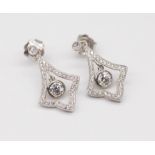 A fine pair of Art Deco style diamond drop earrings, set in 18ct white gold, length 25mm.