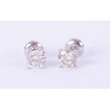 A pair of 14k white gold and diamond earrings, weight 1.09 carat, colour E-F, clarity VS1-VS2