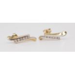 A pair of 9ct yellow gold and diamond set earrings of contemporary design.