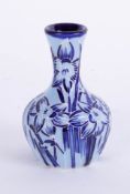 Moorcroft, a modern small blue Florian style vase (a second), 10cm height, not marked Moorcroft.