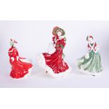 Three Royal Doulton Christmas figures including 'Christmas Day, 2005', 'Christmas