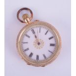 A Victorian 18ct fob watch, the enamel dial with gilt decoration, black Roman numerals and gold