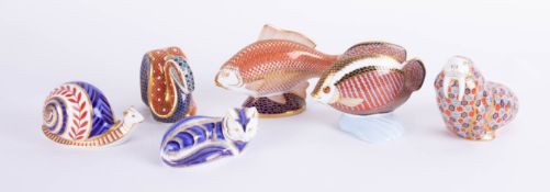 A collection of six Royal Crown Derby paperweights including Snail, Snake, Walrus etc