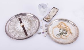 A collection including faux pearls, a dress ring, a pair of bullet cufflinks, costume jewellery,