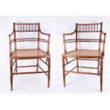 A set of six early 20th century faux bamboo dining chairs with later cane seats (four plus two).