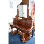 A Victorian mahogany 'Duchess' dressing table.