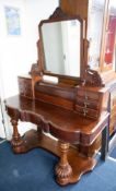 A Victorian mahogany 'Duchess' dressing table.