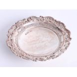 A round silver dish with decorative embossed border, round pedestal base, Sheffield maker H.W,