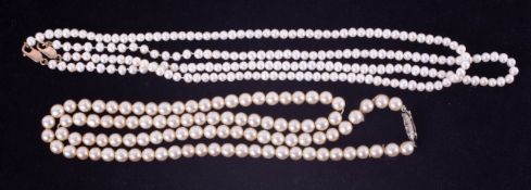 Two freshwater pearl necklaces, each approximately 46cm and a faux pearl necklace (3).