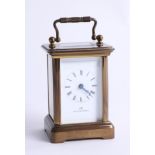 A Matthew Norman miniature brass carriage clock with winding key, Roman numerals, 11 jewel, height