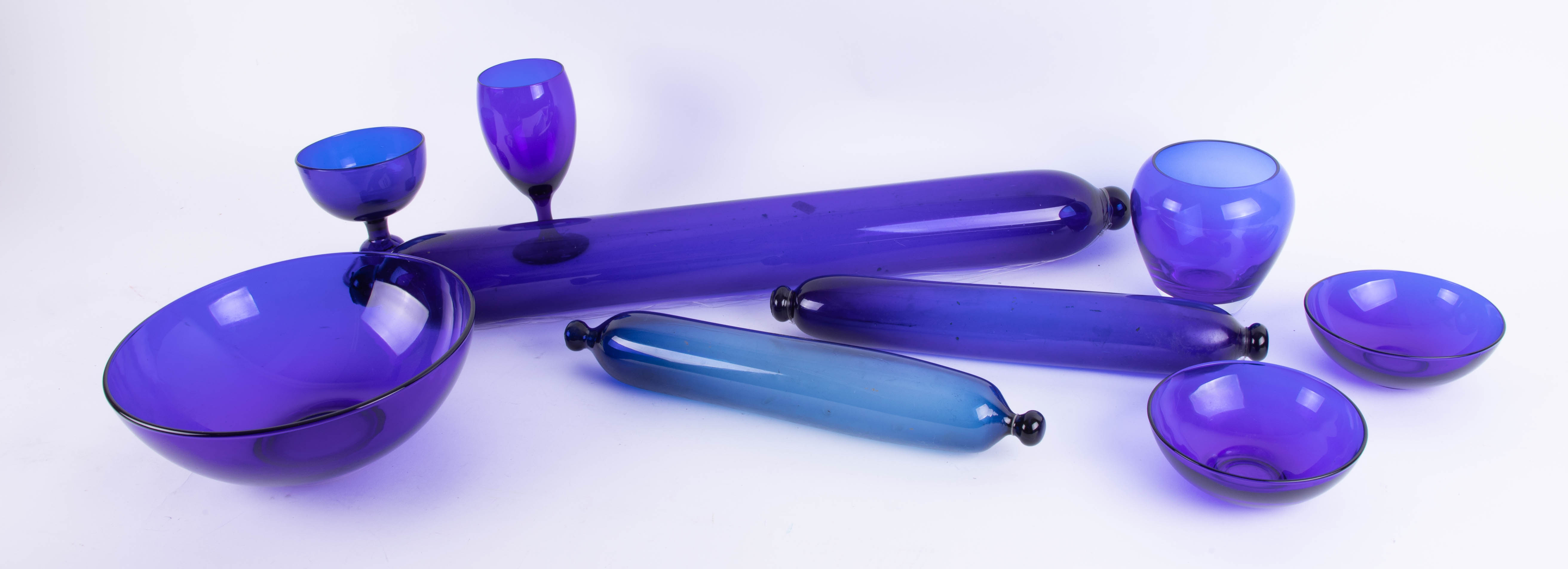 A large Victorian Bristol blue glass rolling pin, length 71cm, together with two other smaller