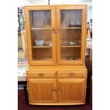 Ercol, a light wood and glazed side cabinet bookcase, width 91cm, height 162cm.